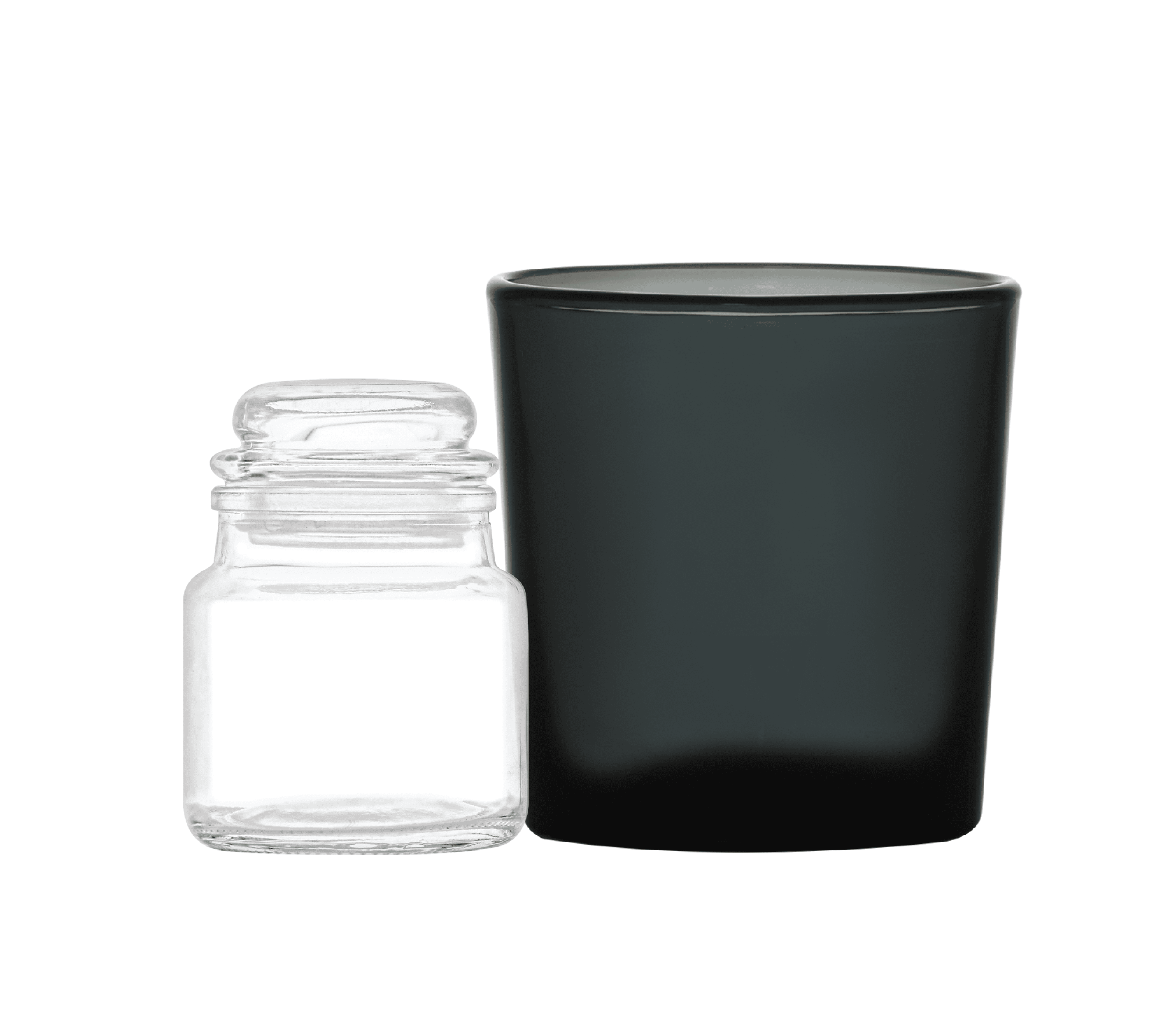 Photo of two kinds of candle glasses. One is an apothecary-style set with a lid and the other is a black candle glass.