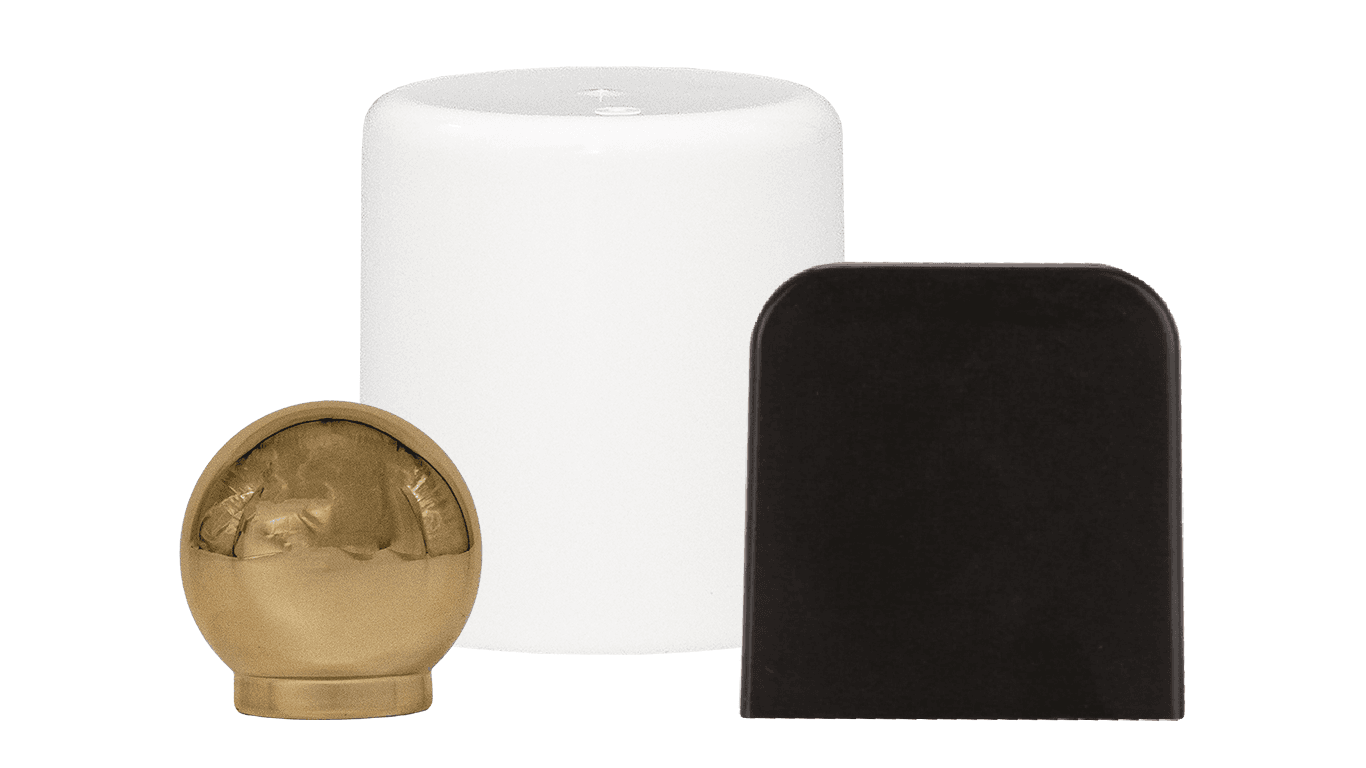 A group of overcaps and hoods including a metal-shelled overcap, a white and a black overcap.