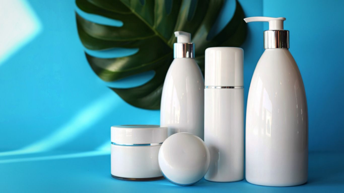 White packaging with metal-shelled closures.